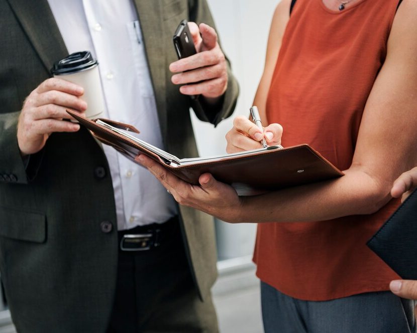 Business people together communication people-looking-picture-album-scaled-img